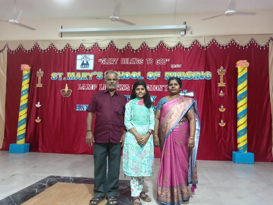 Lamp-lighting ceremony at St. Mary’s School of Nursing, with her parents.